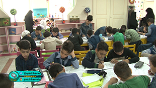 رقابت دانش آموزان قمی در مسابقه خوشنویسی