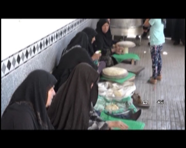 پخت نان صلواتی در زرند