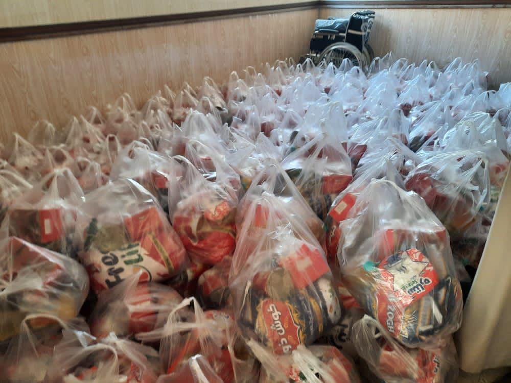 نیکوکاران اشکنانی در کنار سیل زدگان بیرم