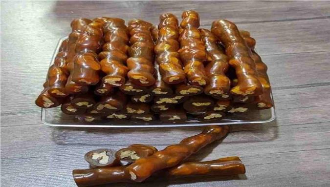 باسلوق با شیره انگور؛ شیرینی بسیار مقوی و سالم باسلوق با شیره انگور؛ شیرینی بسیار مقوی و سالم