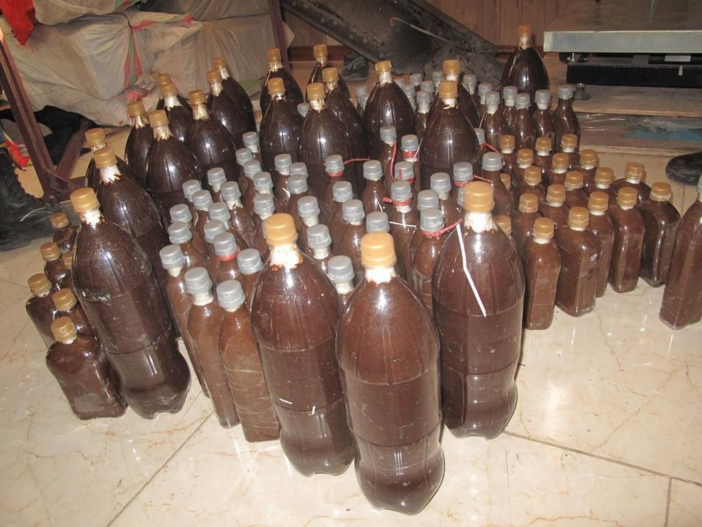 جاساز ۱۳۶ کیلو گرم تریاک در بطری های نوشابه جاساز ۱۳۶ کیلو گرم تریاک در بطری های نوشابه