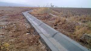 اجرای طرح سربند و کانال آب کشاورزی در میلاس