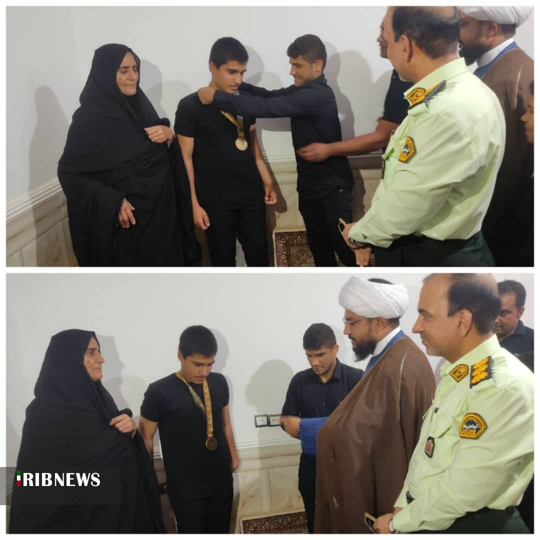قهرمان کشتی مدال خود را به خانواده شهید شهرکی اهدا کرد قهرمان کشتی مدال خود را به خانواده شهید شهرکی اهدا کرد