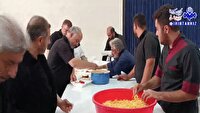 توزیع غذای نذری به یاد شهدای روستای ورجوی مراغه