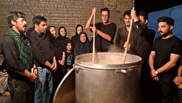طبخ و توزیع 200 دیگ حلیم نذری در روستای مشهد کاوه